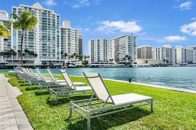 211 Water Way Unit 211, Miami Beach, FL 33141 - view of property's community featuring a lawn, a water view, and a city view