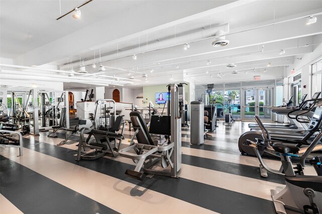 211 Water Way Unit 211, Miami Beach, FL 33141 - gym featuring visible vents, track lighting, and french doors