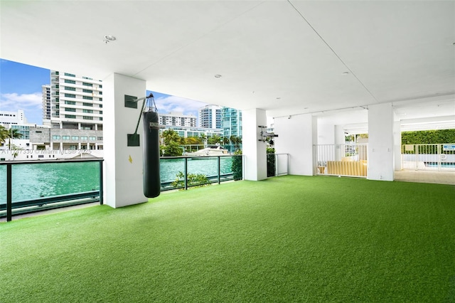 211 Water Way Unit 211, Miami Beach, FL 33141 - view of yard with a balcony, a water view, and a view of city