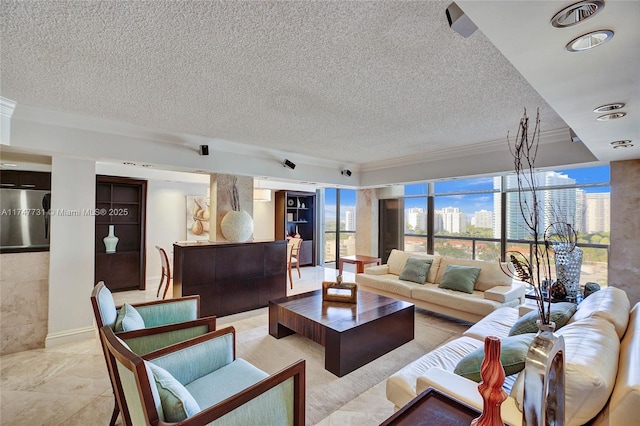 living area featuring crown molding, a view of city, and a textured ceiling