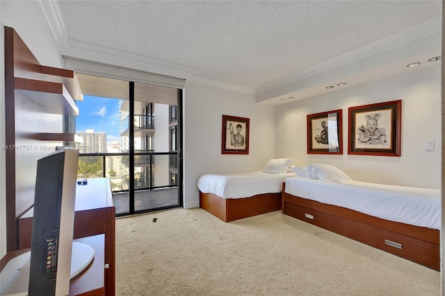 carpeted bedroom featuring crown molding, recessed lighting, a textured ceiling, and access to exterior