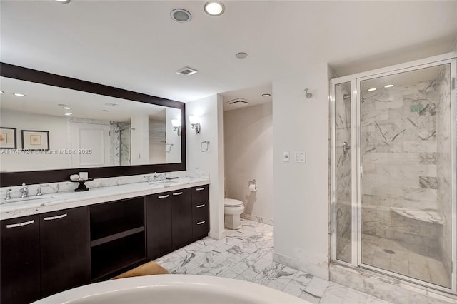 bathroom with baseboards, a sink, and a shower stall