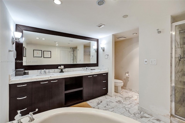 full bath with baseboards, a sink, marble finish floor, and a stall shower