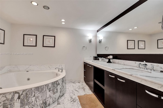 bathroom featuring a sink, double vanity, marble finish floor, and recessed lighting