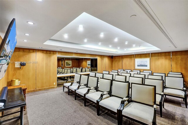 19667 Turnberry Way Unit 12F, Aventura, FL 33180 - cinema room with recessed lighting, a tray ceiling, and wood walls