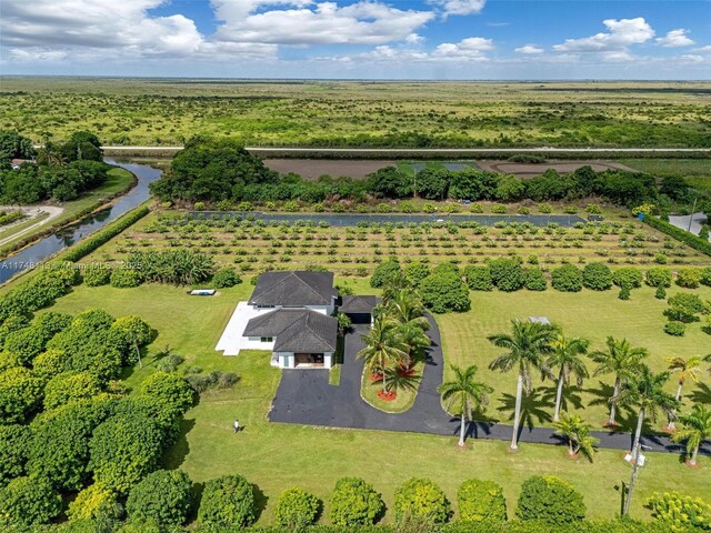 bird's eye view with a rural view and a water view