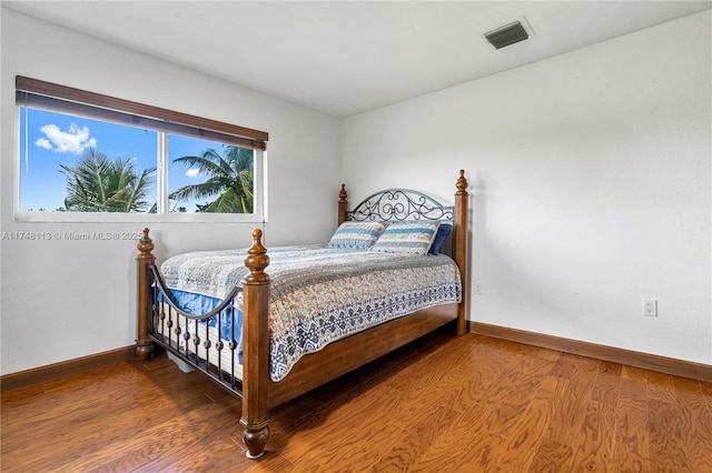 bedroom featuring baseboards