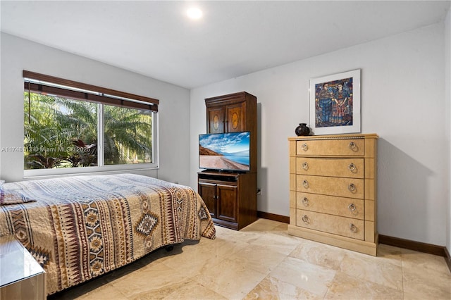 bedroom with baseboards