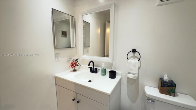 half bath with toilet and vanity