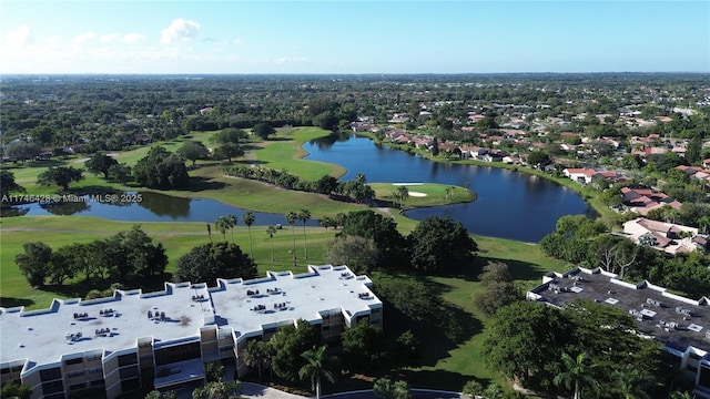 drone / aerial view featuring a water view and golf course view