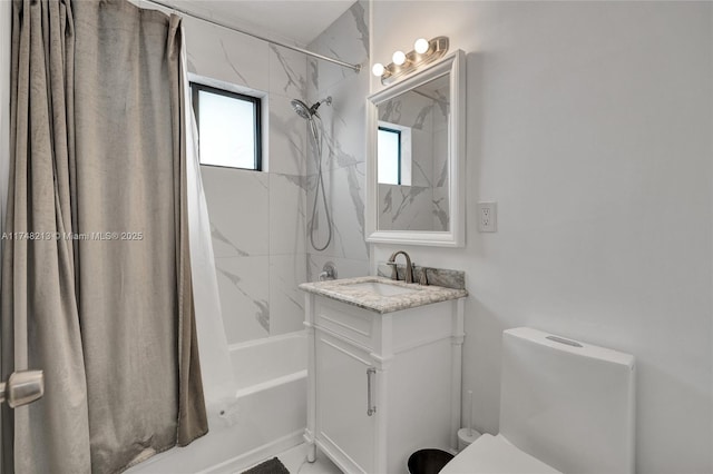 full bathroom featuring vanity, toilet, and shower / bath combo with shower curtain