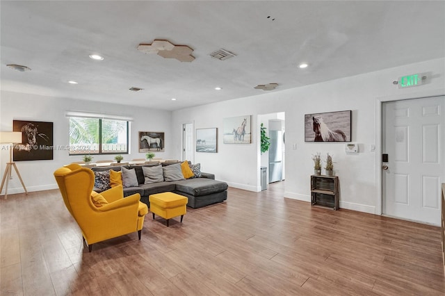 living room with hardwood / wood-style flooring