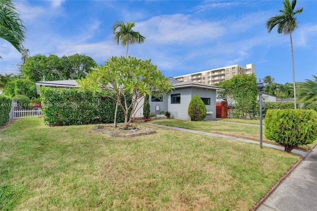 view of front of home with a front lawn