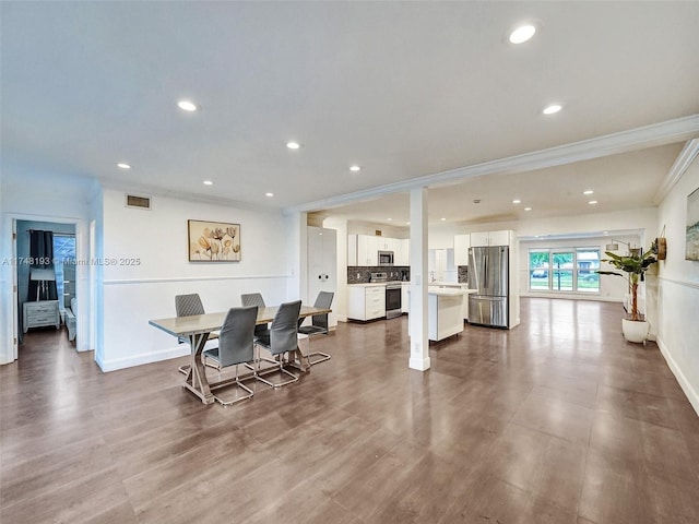 4721 W Park Rd, Hollywood, FL 33021 - dining area featuring ornamental molding, baseboards, recessed lighting, and dark wood-type flooring