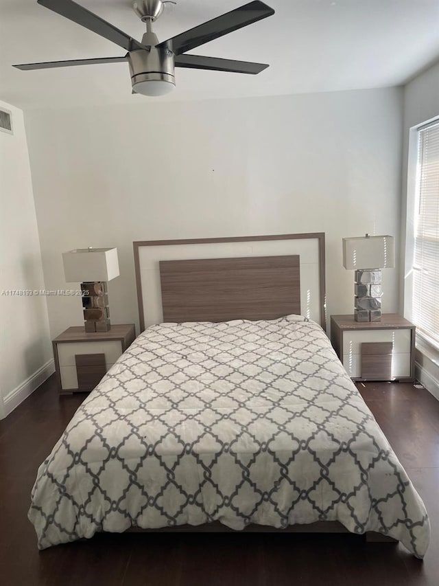 4721 W Park Rd, Hollywood, FL 33021 - bedroom with dark wood finished floors, baseboards, and a ceiling fan
