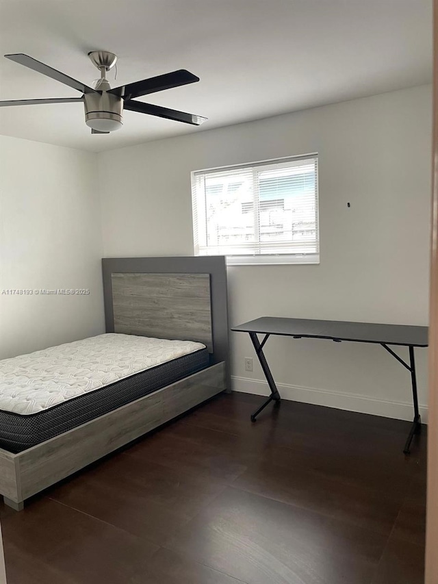 4721 W Park Rd, Hollywood, FL 33021 - bedroom featuring dark wood-style flooring, baseboards, and a ceiling fan