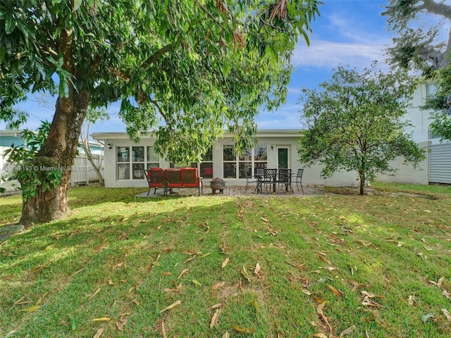4721 W Park Rd, Hollywood, FL 33021 - back of property with stucco siding and a patio area