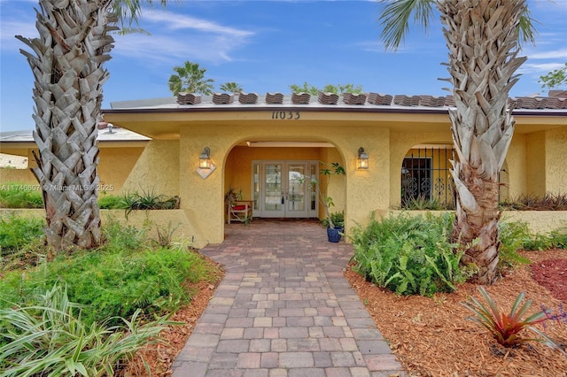 view of exterior entry with french doors