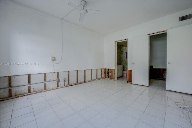 unfurnished room featuring ceiling fan