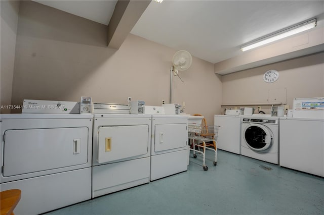 laundry area with separate washer and dryer