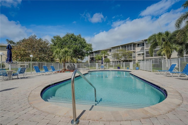 view of swimming pool featuring a patio