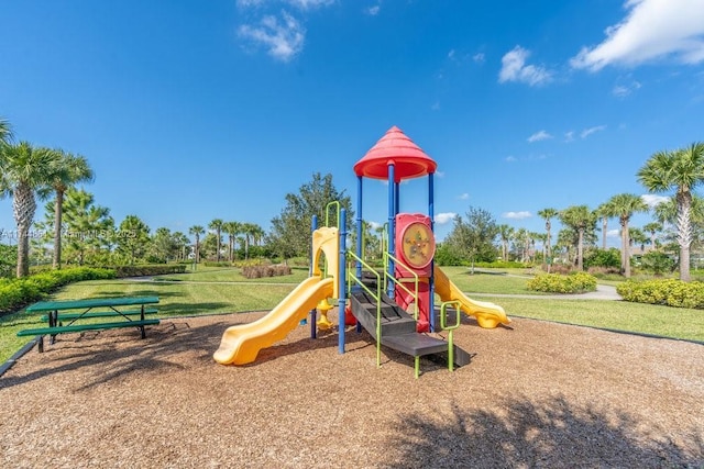 view of playground featuring a lawn