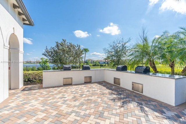 view of patio with area for grilling and grilling area