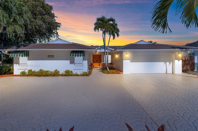 view of front of home featuring a garage