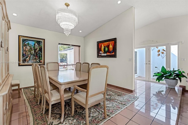 dining space featuring recessed lighting, vaulted ceiling, an inviting chandelier, and light tile patterned floors