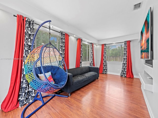 living area featuring hardwood / wood-style flooring