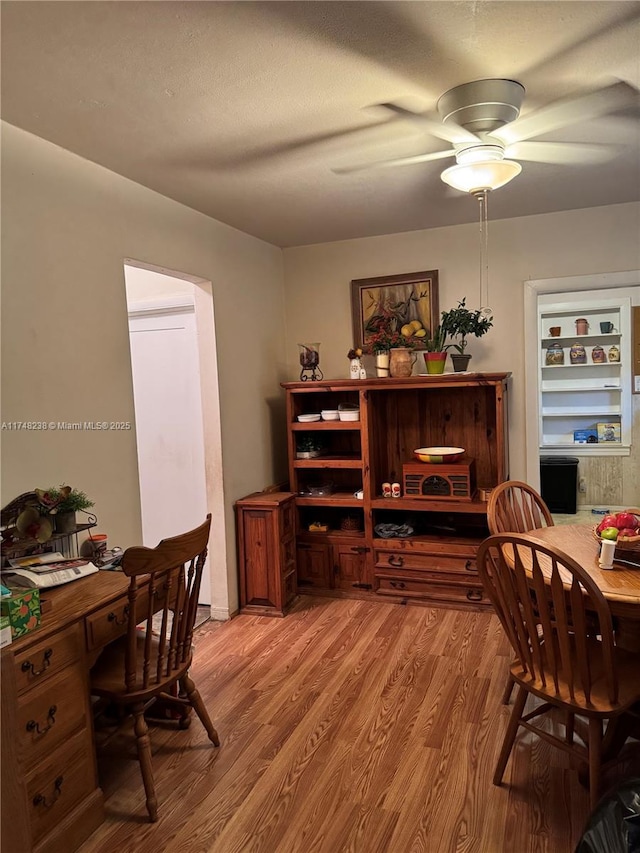 home office with light wood-type flooring