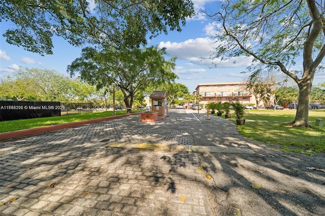 view of community featuring a yard