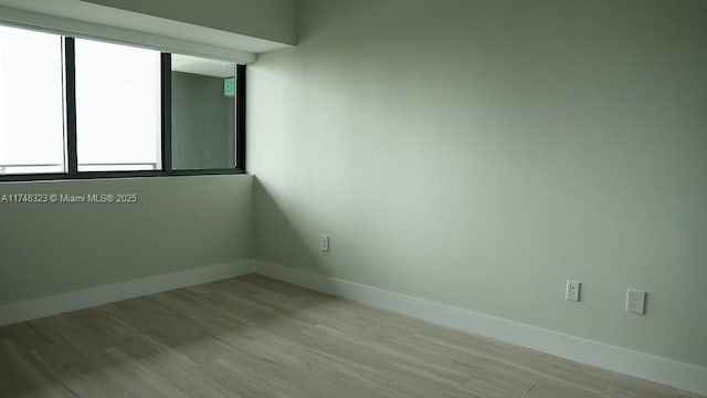 650 NE 32nd St Unit 2105, Miami, FL 33137 - empty room with wood finished floors