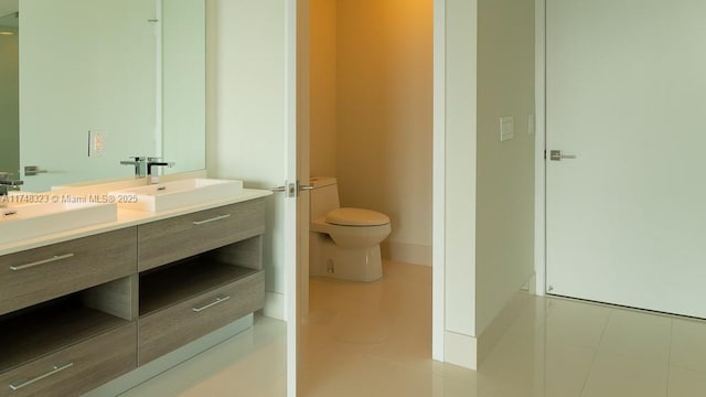 650 NE 32nd St Unit 2105, Miami, FL 33137 - bathroom with double vanity and tile patterned flooring