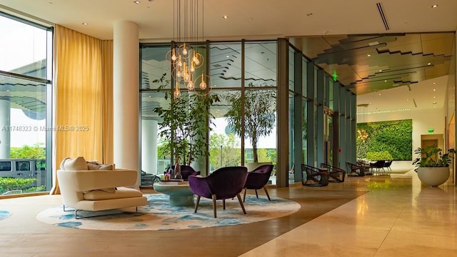 650 NE 32nd St Unit 2105, Miami, FL 33137 - common area with expansive windows and a towering ceiling