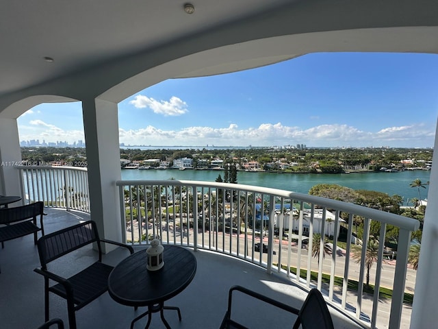 balcony featuring a water view