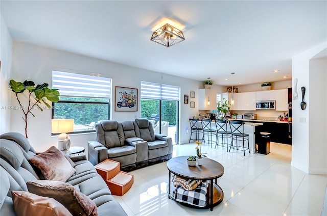 living room with light tile patterned floors