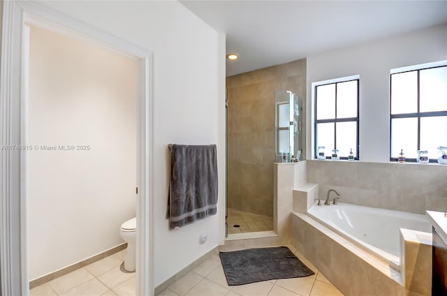 full bathroom featuring tile patterned flooring, independent shower and bath, vanity, and toilet