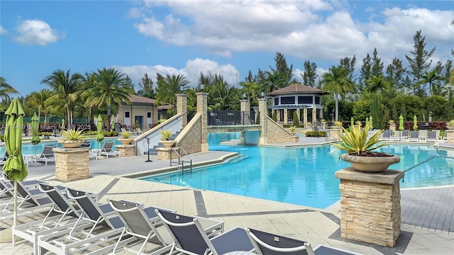 view of swimming pool featuring a patio