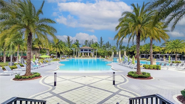 view of swimming pool with a patio and a gazebo