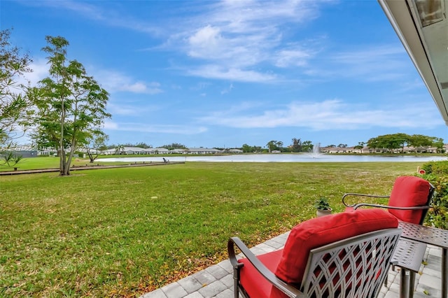 view of yard with a water view