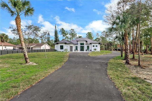 single story home with a front yard