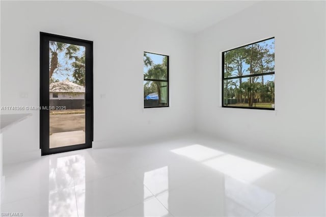 empty room with tile patterned floors