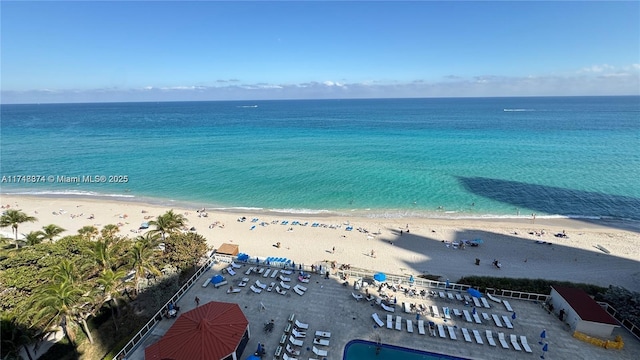 bird's eye view featuring a water view and a view of the beach