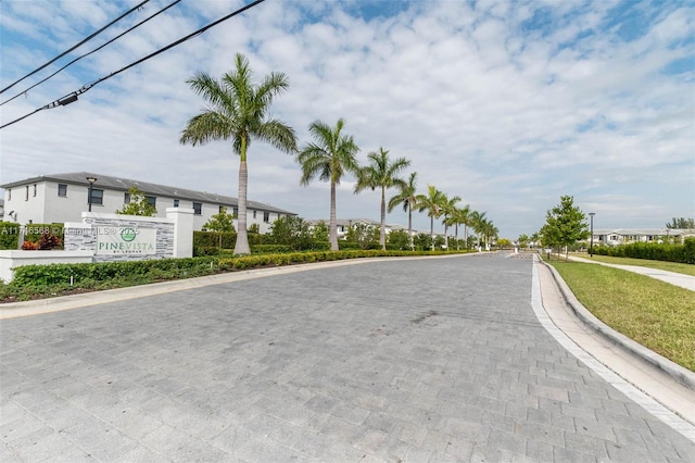 view of street featuring curbs