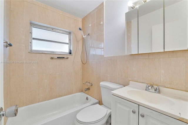 bathroom featuring  shower combination, toilet, tile walls, and vanity