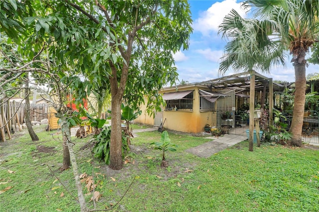 view of yard featuring fence