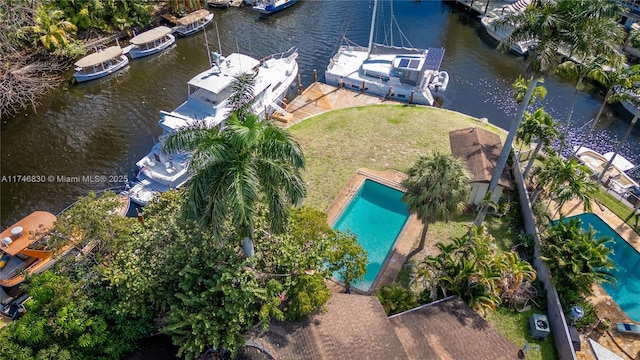 bird's eye view with a water view