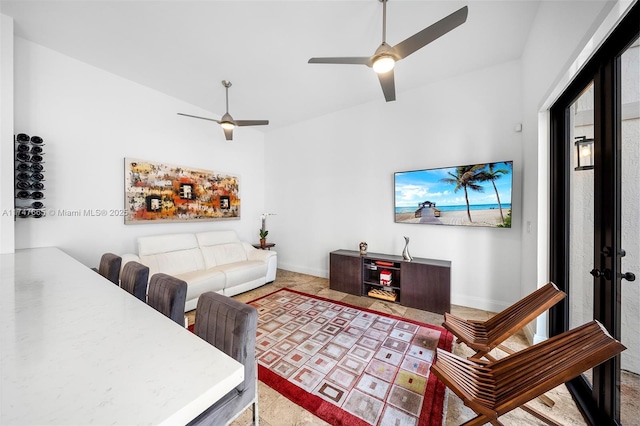 carpeted living room featuring ceiling fan