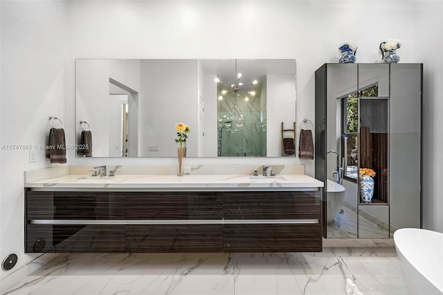 bathroom featuring vanity and a bath